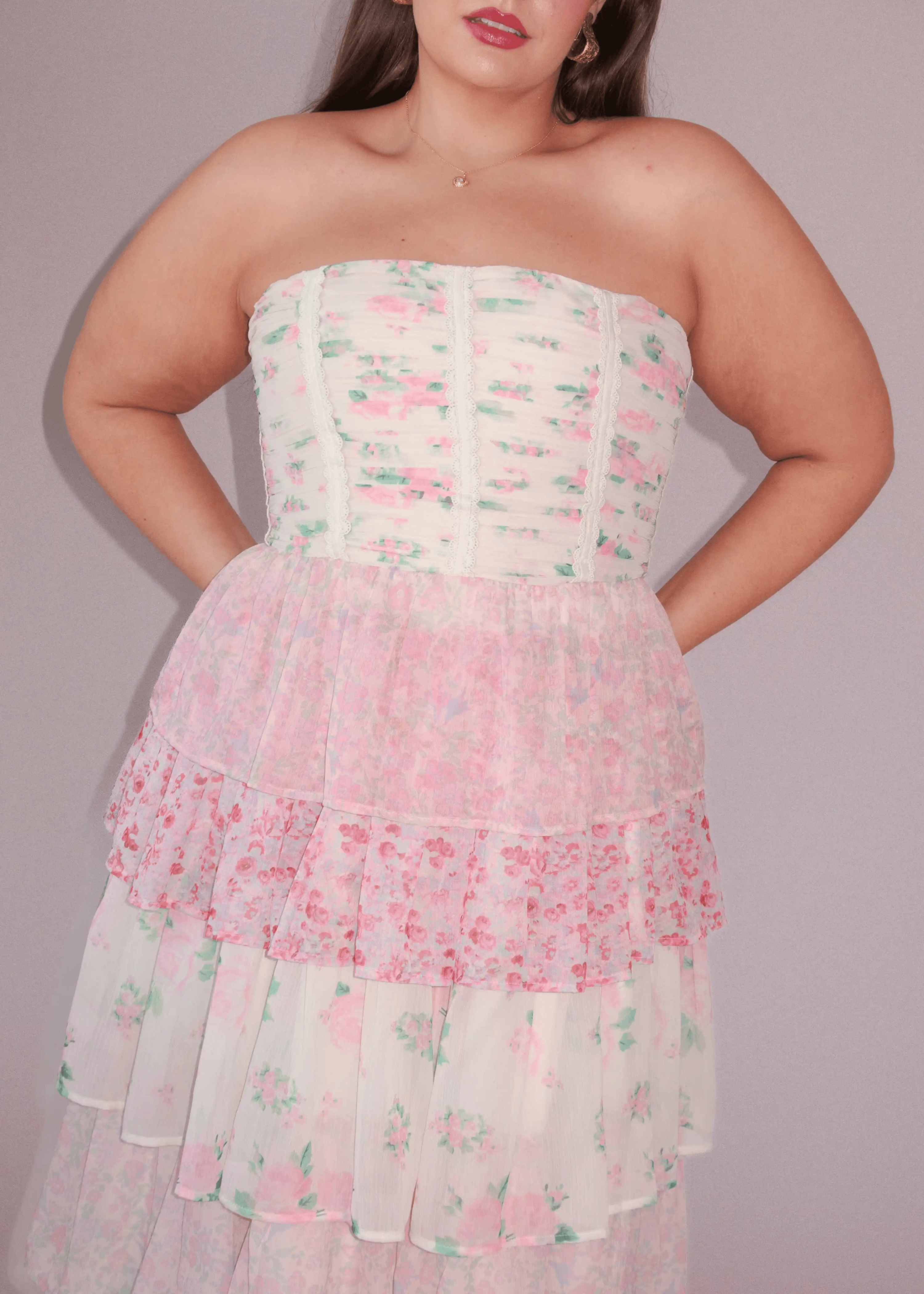 chic size inclusive model wearing JessaKae Rosemary Strapless Tiered Maxi Dress - Pink