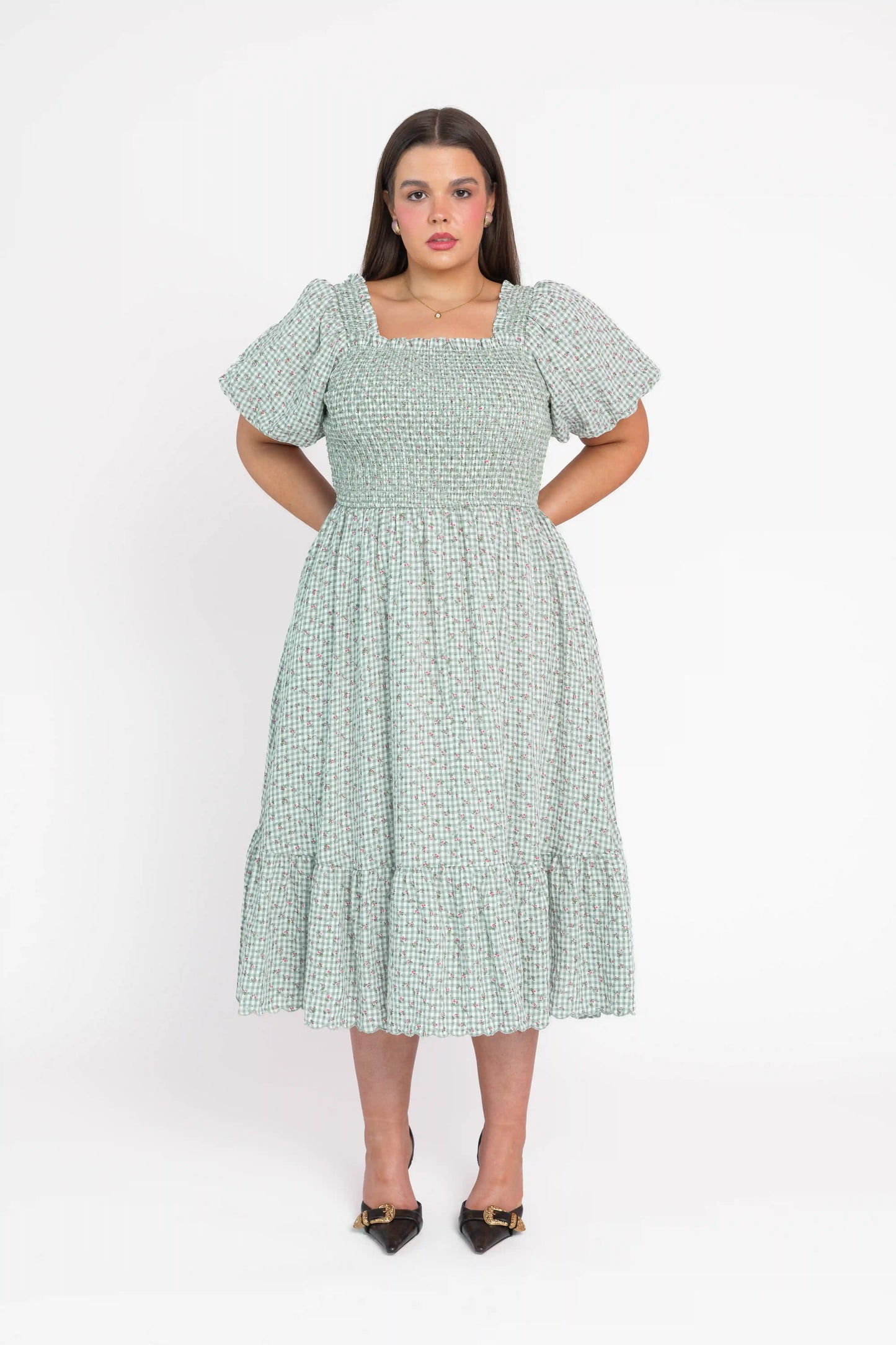 chic size inclusive model wearing JessaKae Rosie Posie Dress Dresses