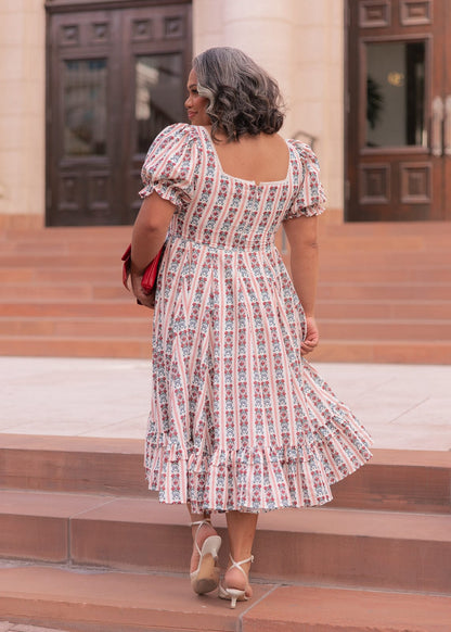 chic size inclusive model wearing JessaKae Rue Dress