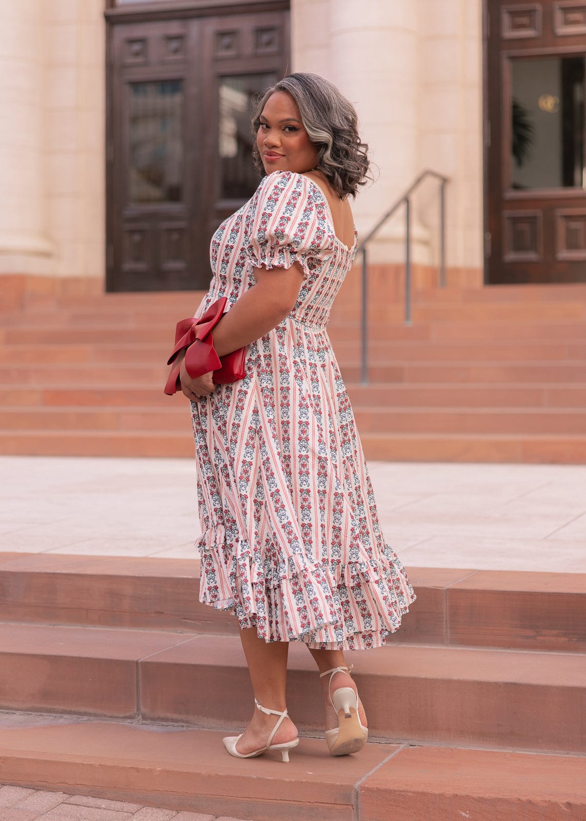 chic size inclusive model wearing JessaKae Rue Dress