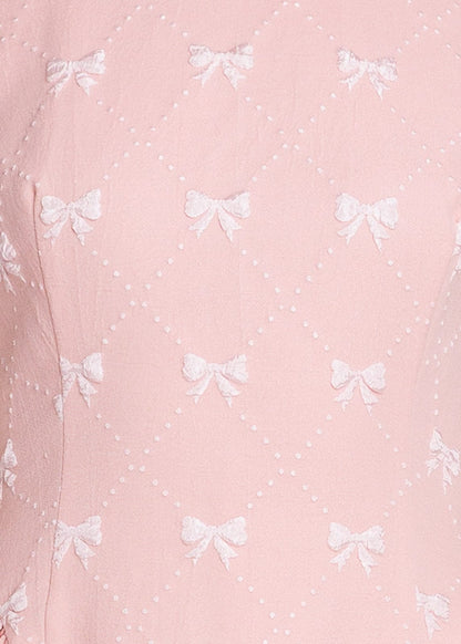 chic size inclusive model wearing JessaKae Scarlett Bubble Hem Mini Dress - Pink