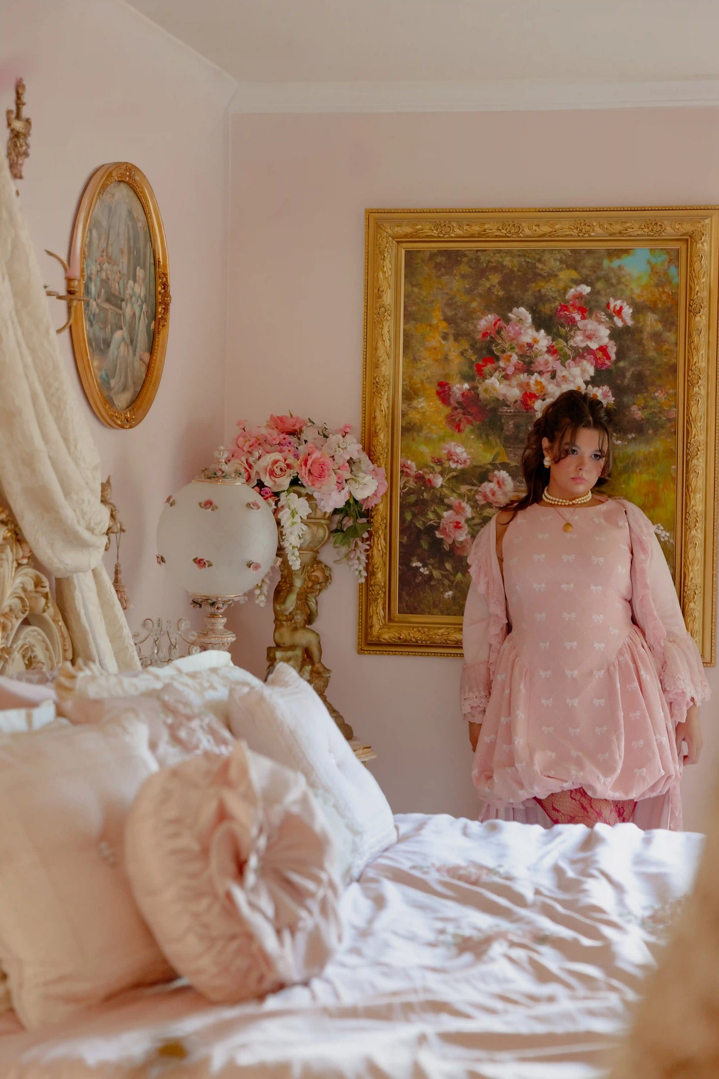 chic size inclusive model wearing JessaKae Scarlett Bubble Hem Mini Dress - Pink