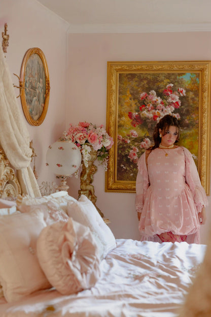 chic size inclusive model wearing JessaKae Scarlett Bubble Hem Mini Dress - Pink