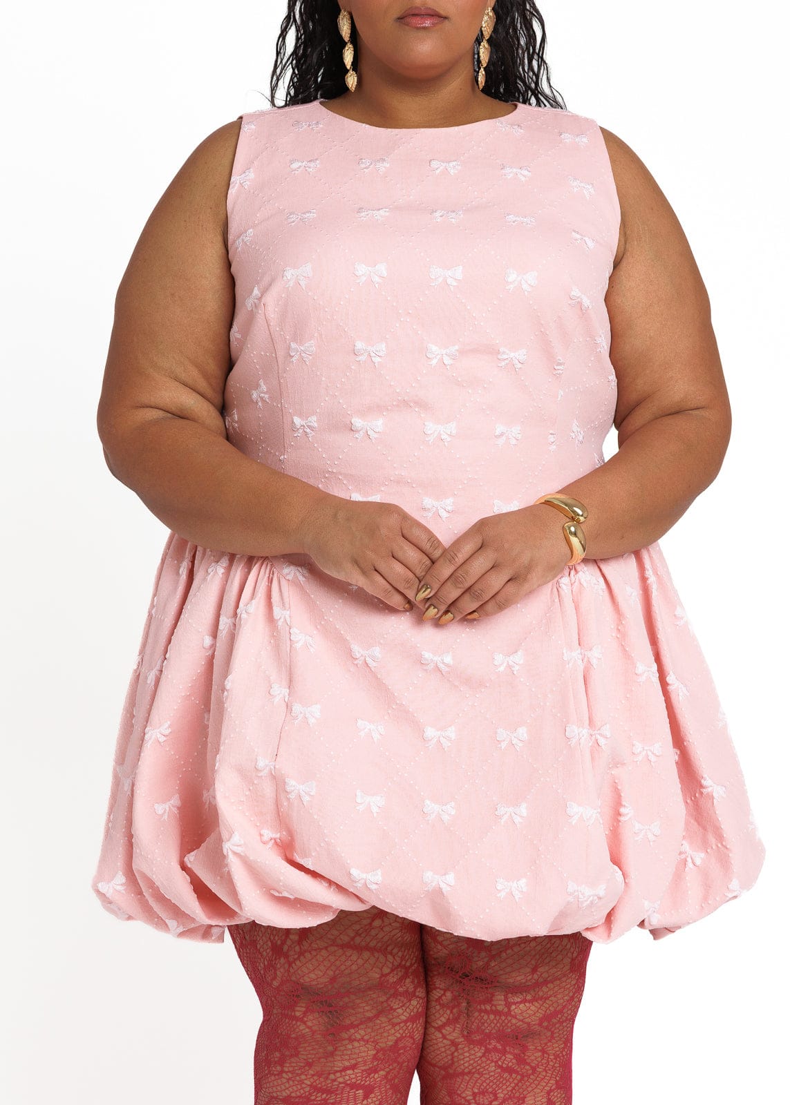 chic size inclusive model wearing JessaKae Scarlett Bubble Hem Mini Dress - Pink