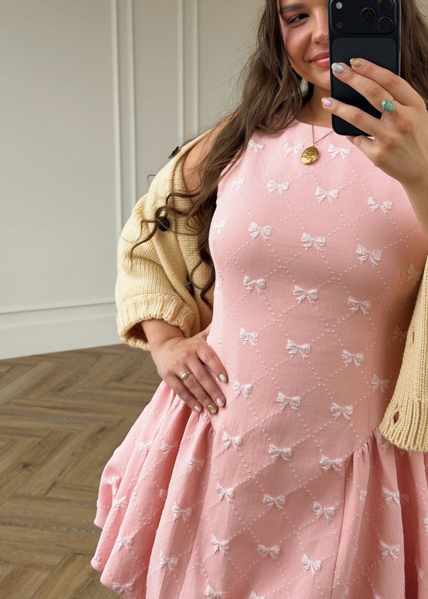 chic size inclusive model wearing JessaKae Scarlett Bubble Hem Mini Dress - Pink Dresses