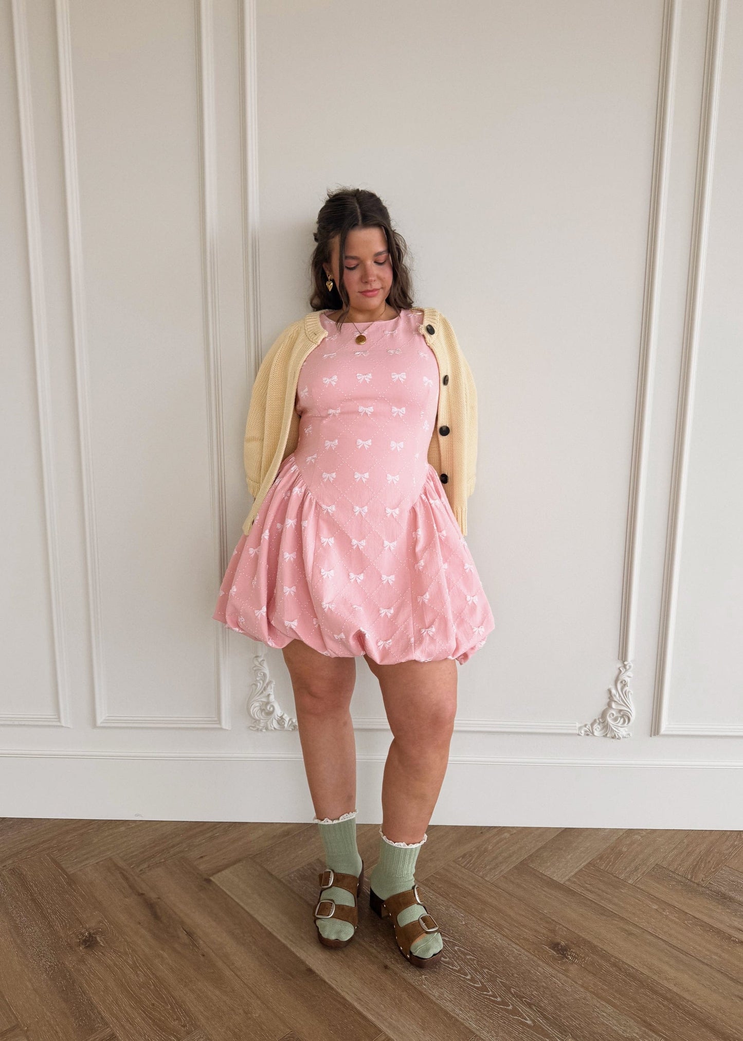 chic size inclusive model wearing JessaKae Scarlett Bubble Hem Mini Dress - Pink Dresses
