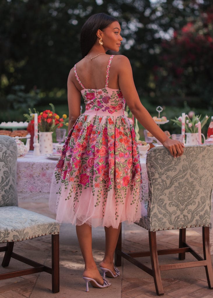 chic size inclusive model wearing JessaKae Secret Garden Dress