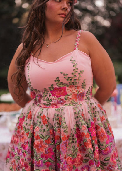 chic size inclusive model wearing JessaKae Secret Garden Dress