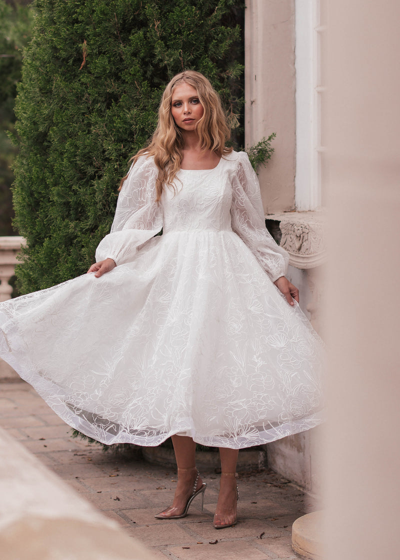 chic size inclusive model wearing JessaKae Serenity Dress Dresses