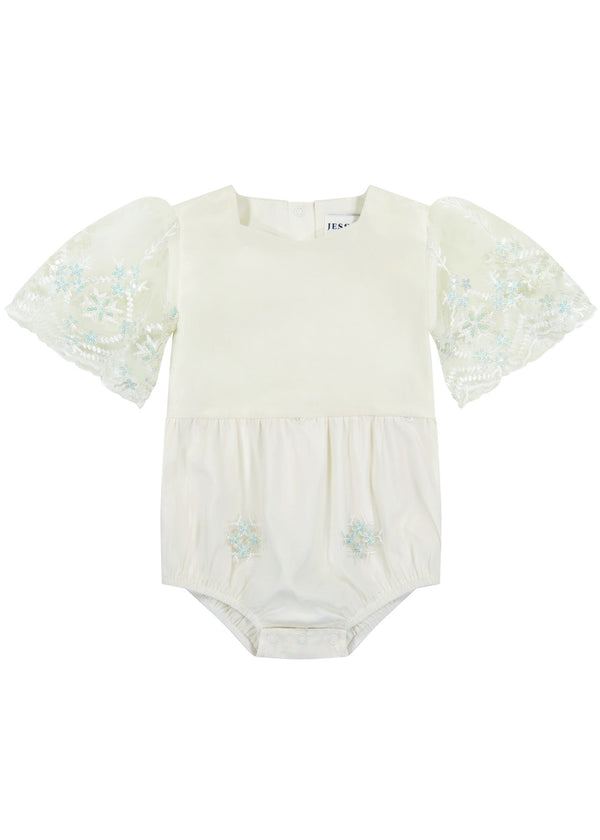 chic size inclusive model wearing JessaKae Snowflake Baby Romper Cream / 0-3M Baby Romper