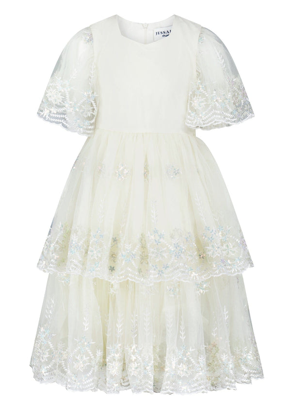 chic size inclusive model wearing JessaKae Snowflake Girls Dress Girls Dress