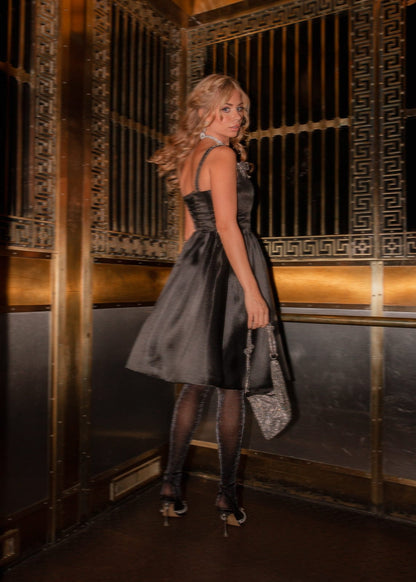 chic size inclusive model wearing JessaKae Spencer Dress