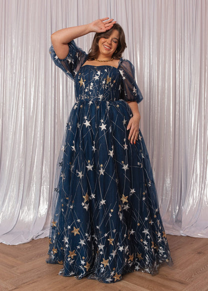 chic size inclusive model wearing JessaKae Starla Dress