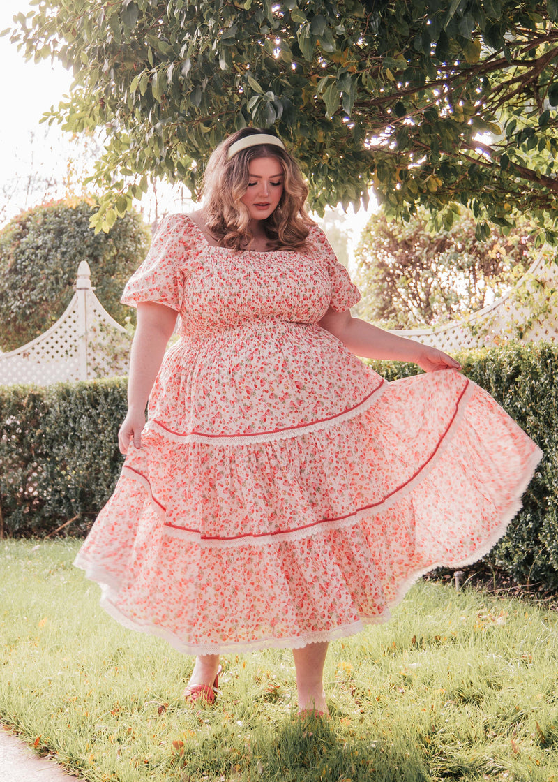 chic size inclusive model wearing JessaKae Strawberry Shortcake Dress Dresses