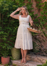 chic size inclusive model wearing JessaKae Summer Meadow Dress Dresses