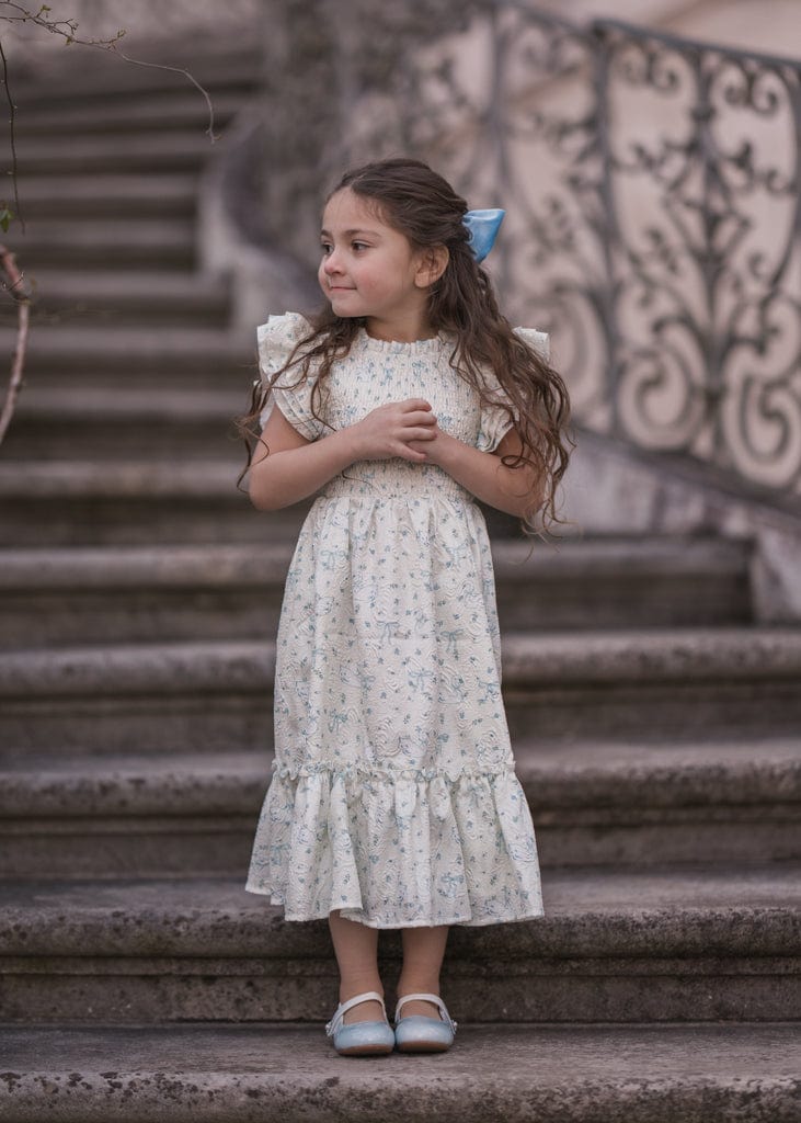 chic size inclusive model wearing JessaKae Swan Serenade Girls Dress