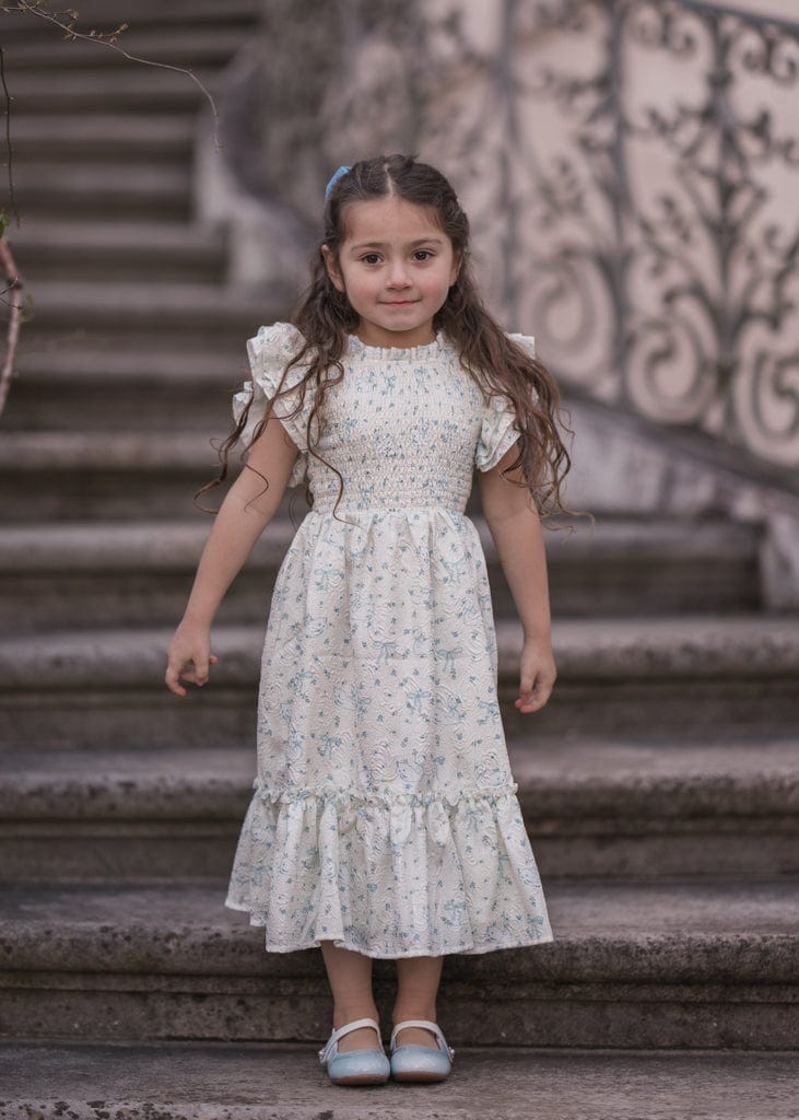 chic size inclusive model wearing JessaKae Swan Serenade Girls Dress