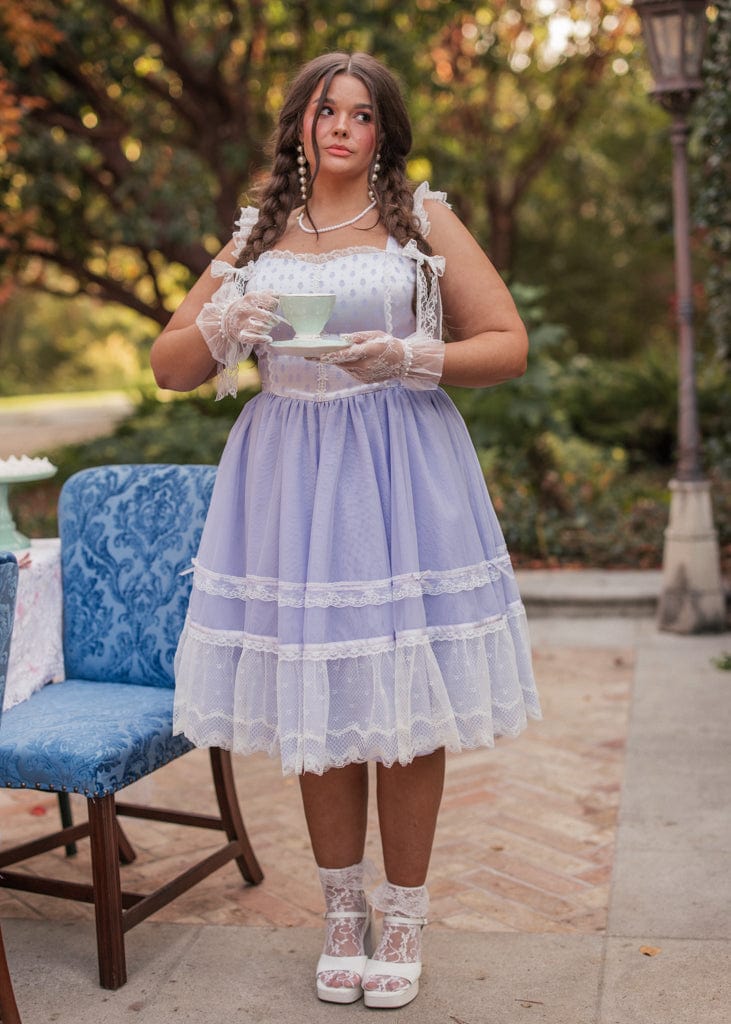 chic size inclusive model wearing JessaKae Teacup Dress