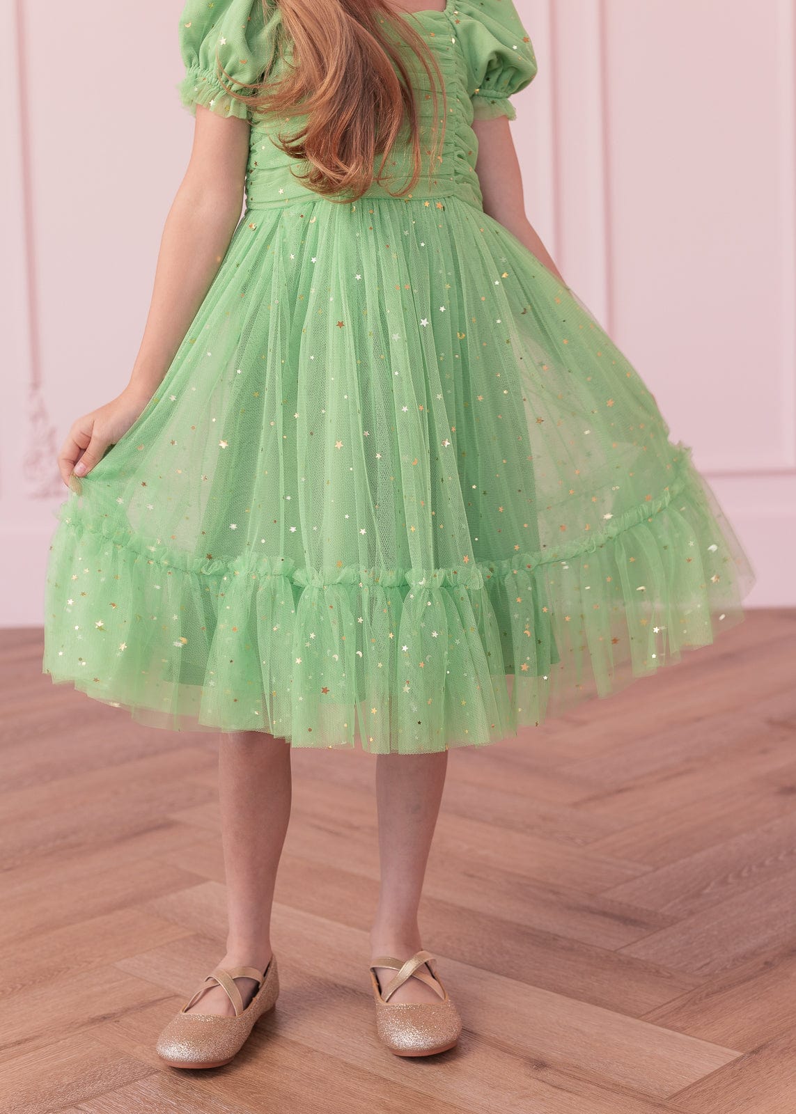 chic size inclusive model wearing JessaKae Tink Girls Dress