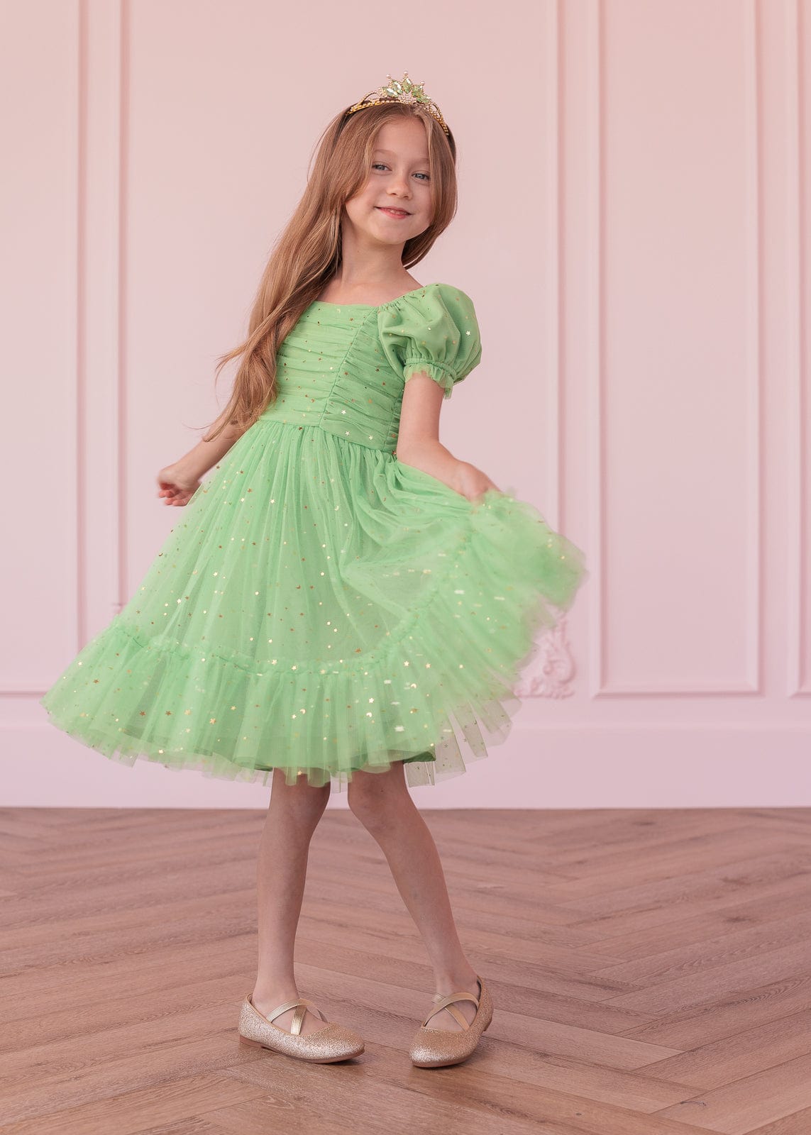 chic size inclusive model wearing JessaKae Tink Girls Dress