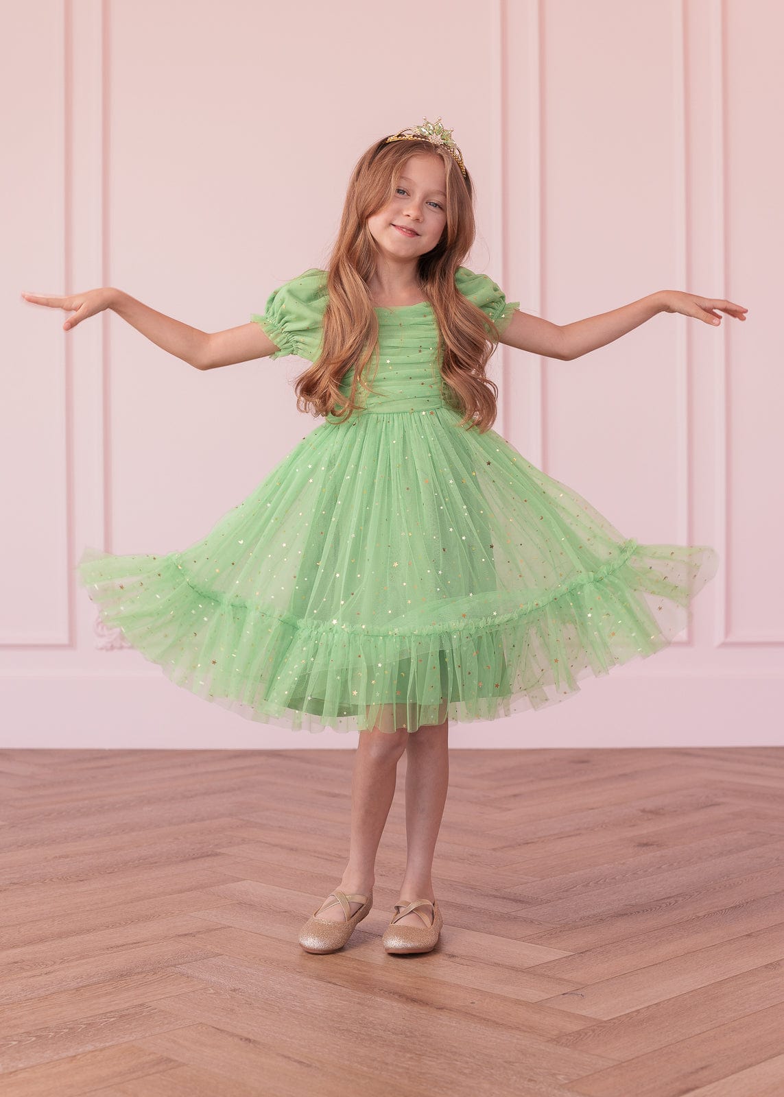 chic size inclusive model wearing JessaKae Tink Girls Dress