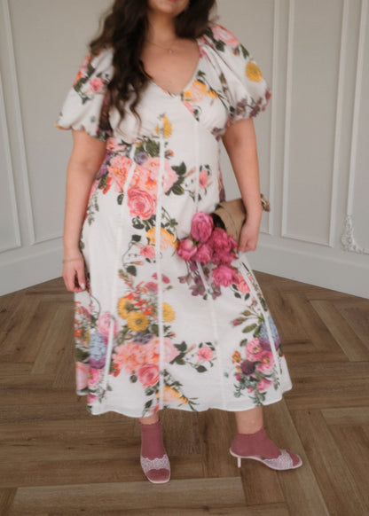 chic size inclusive model wearing JessaKae Valenne Dress