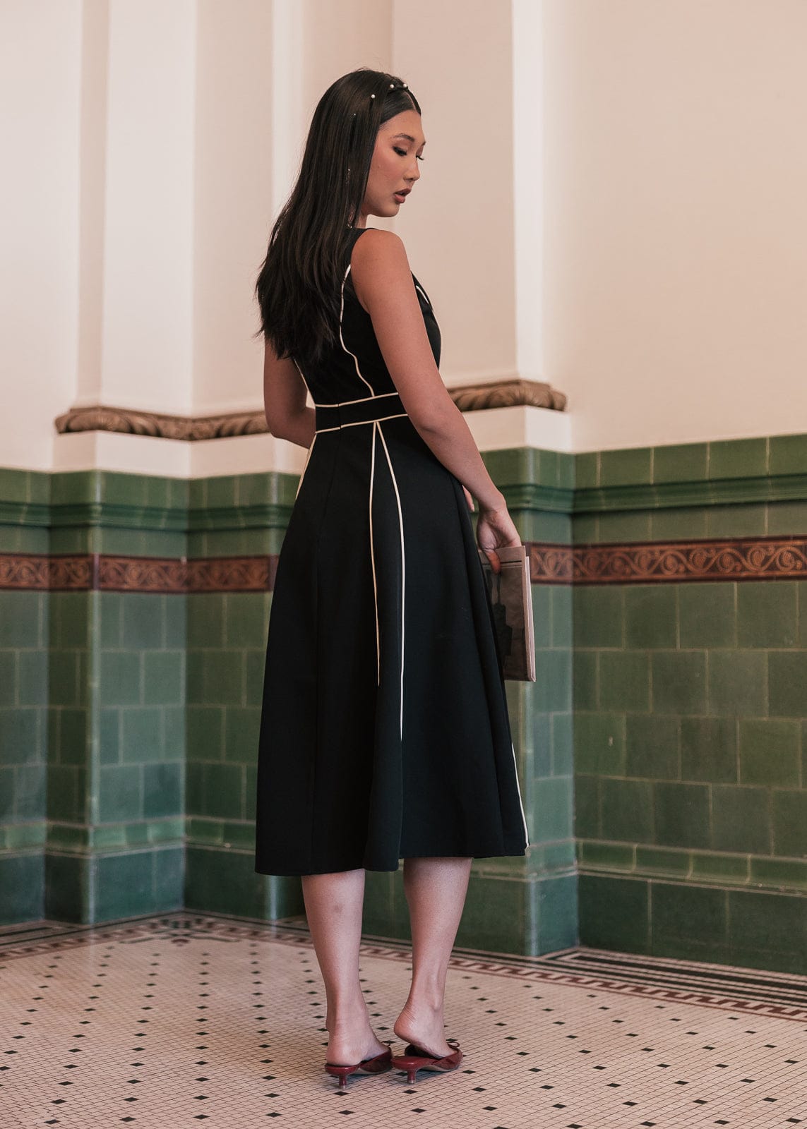 chic size inclusive model wearing JessaKae Vivienne Dress