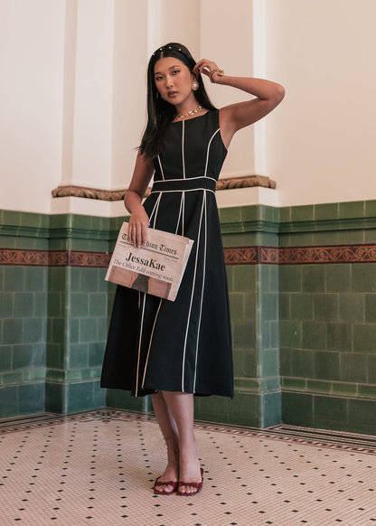 chic size inclusive model wearing JessaKae Vivienne Dress