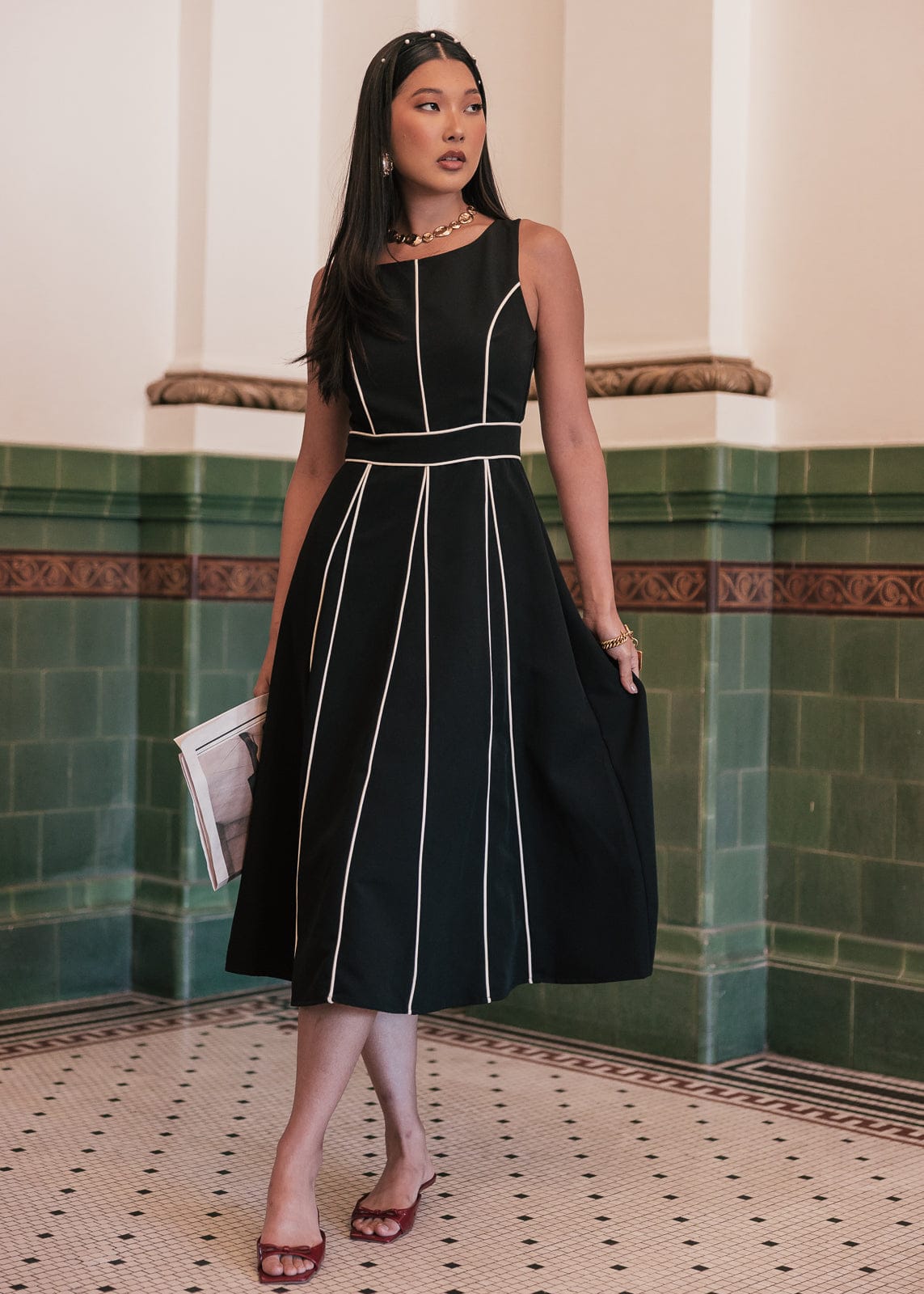 chic size inclusive model wearing JessaKae Vivienne Dress