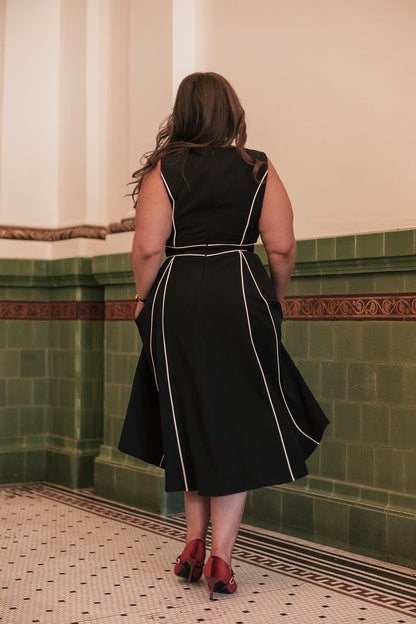 chic size inclusive model wearing JessaKae Vivienne Dress