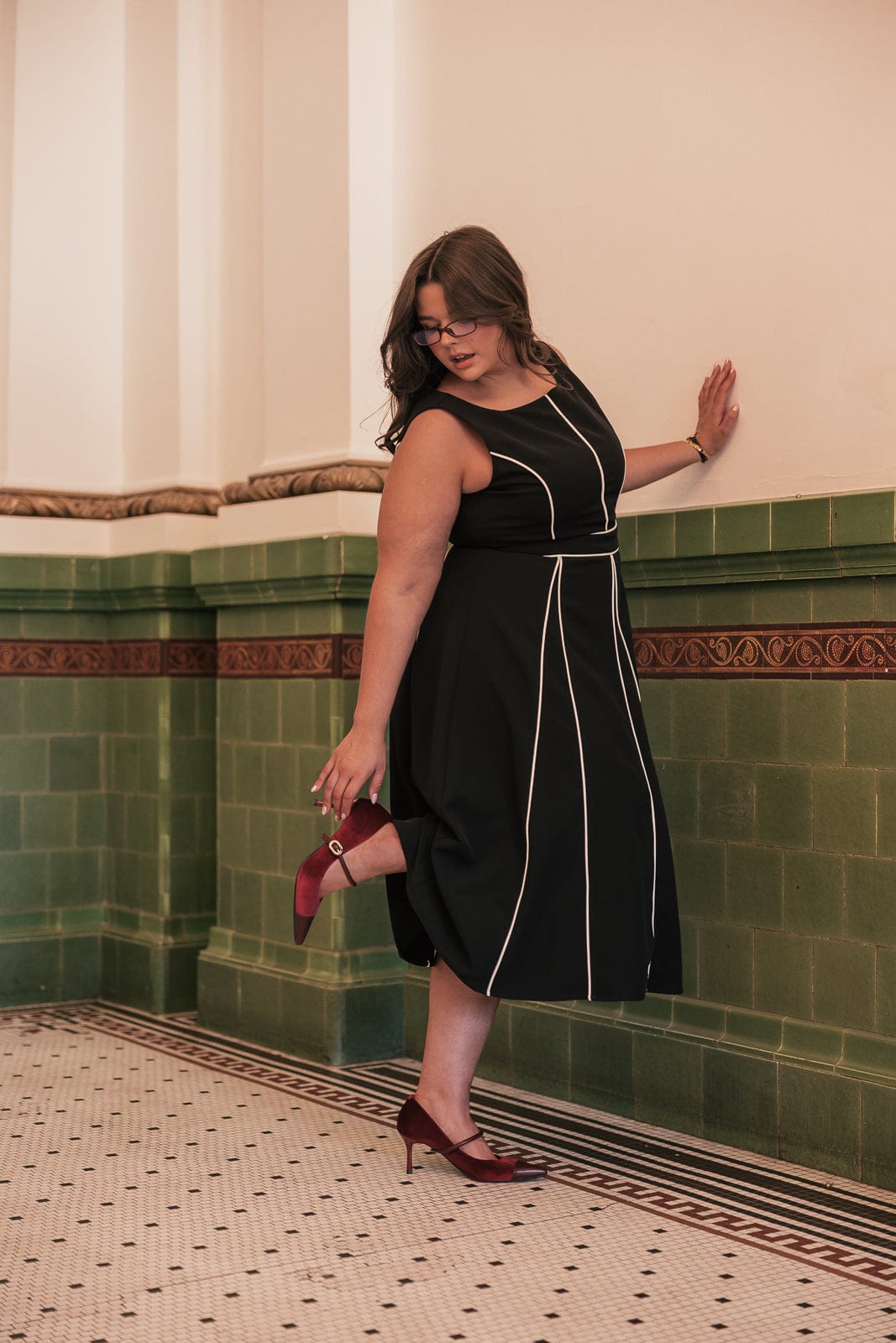 chic size inclusive model wearing JessaKae Vivienne Dress