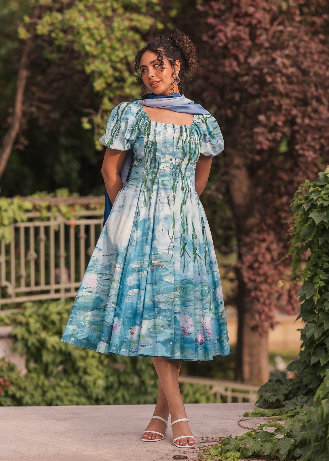 chic size inclusive model wearing JessaKae Water Lily Dress