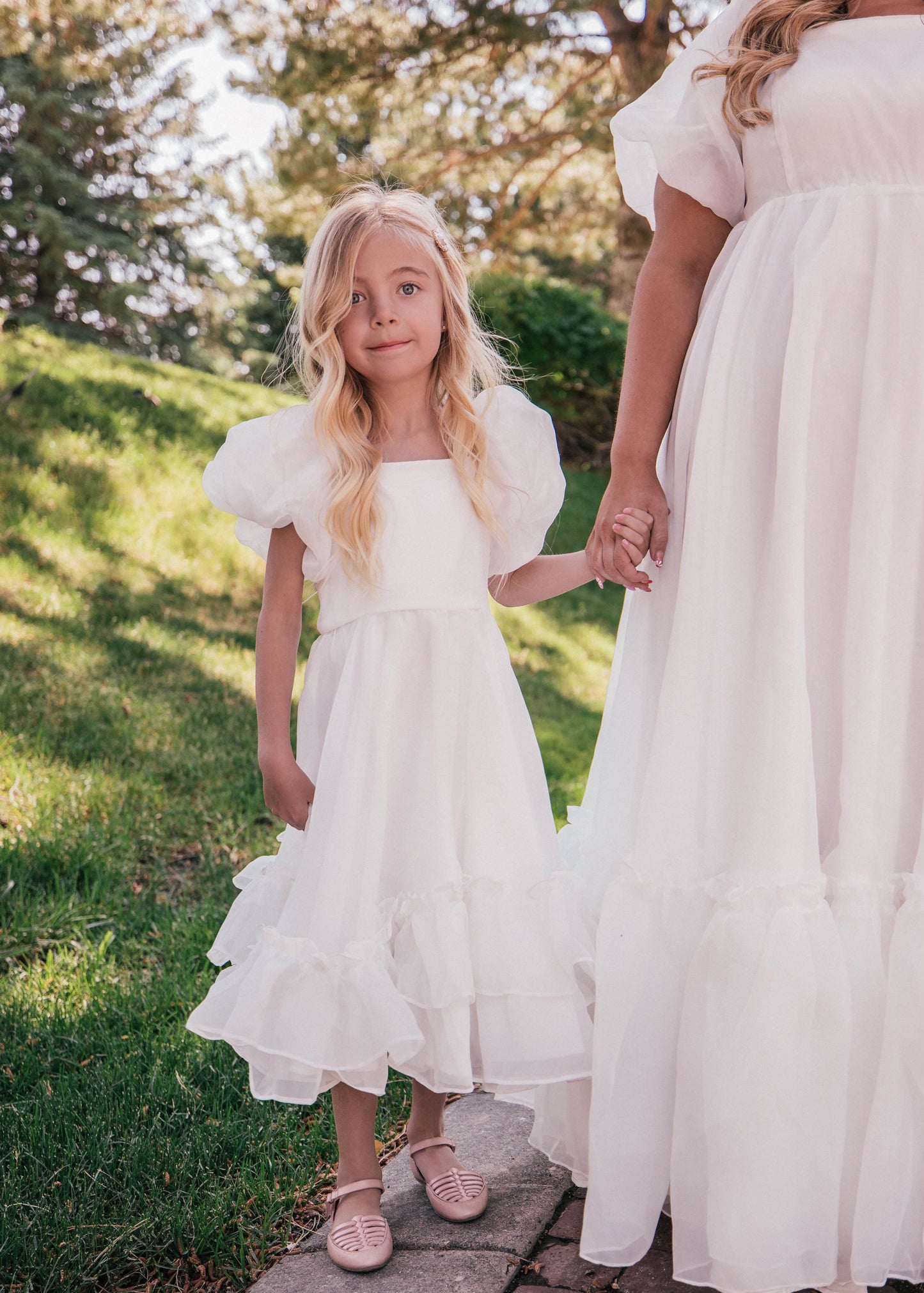 chic size inclusive model wearing JessaKae Wendy Girls Dress_White / 2-3Y  Girls Dress