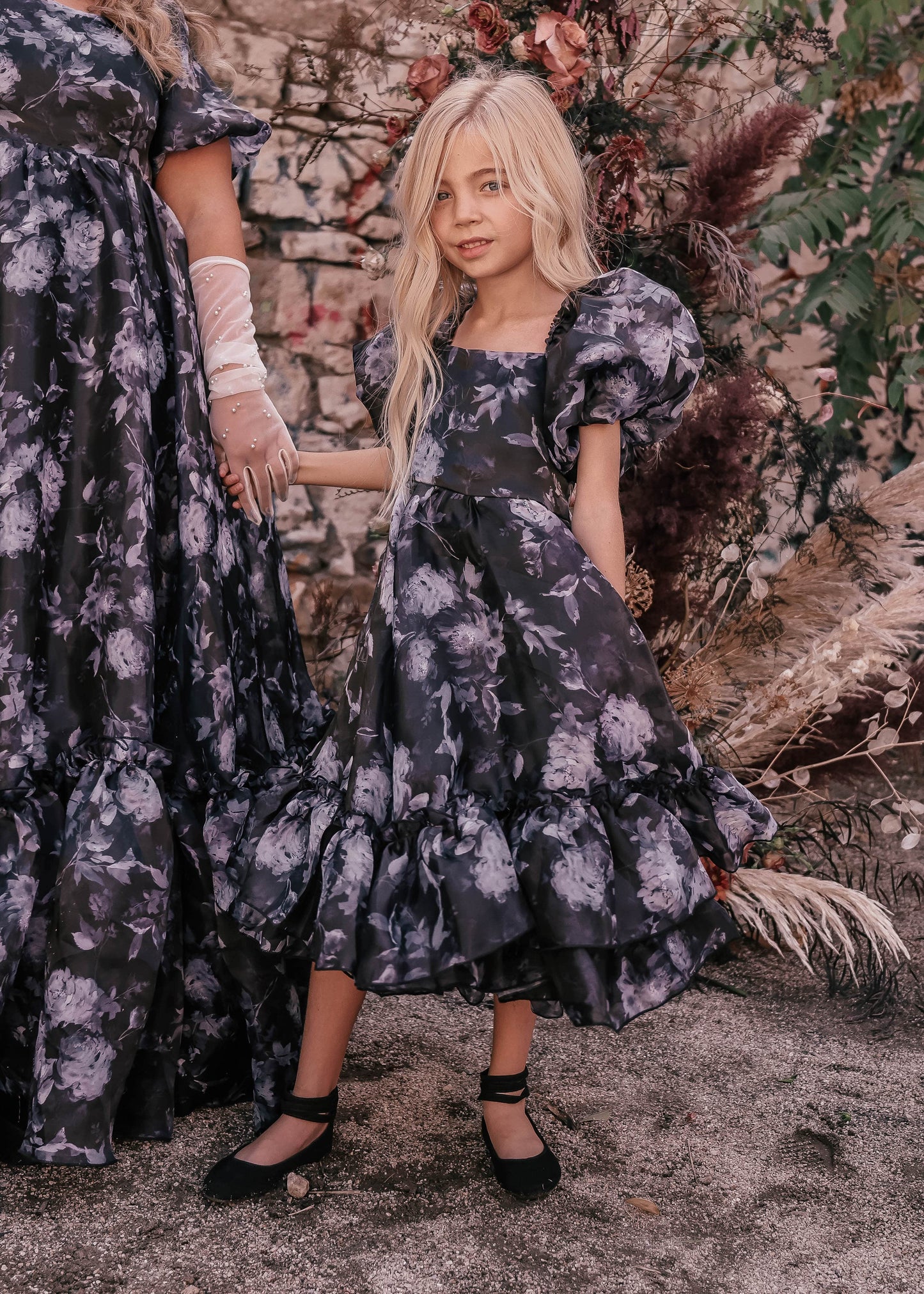 chic size inclusive model wearing JessaKae Wendy Girls Girls Dress_Black Floral / 2-3Y Girls Dress