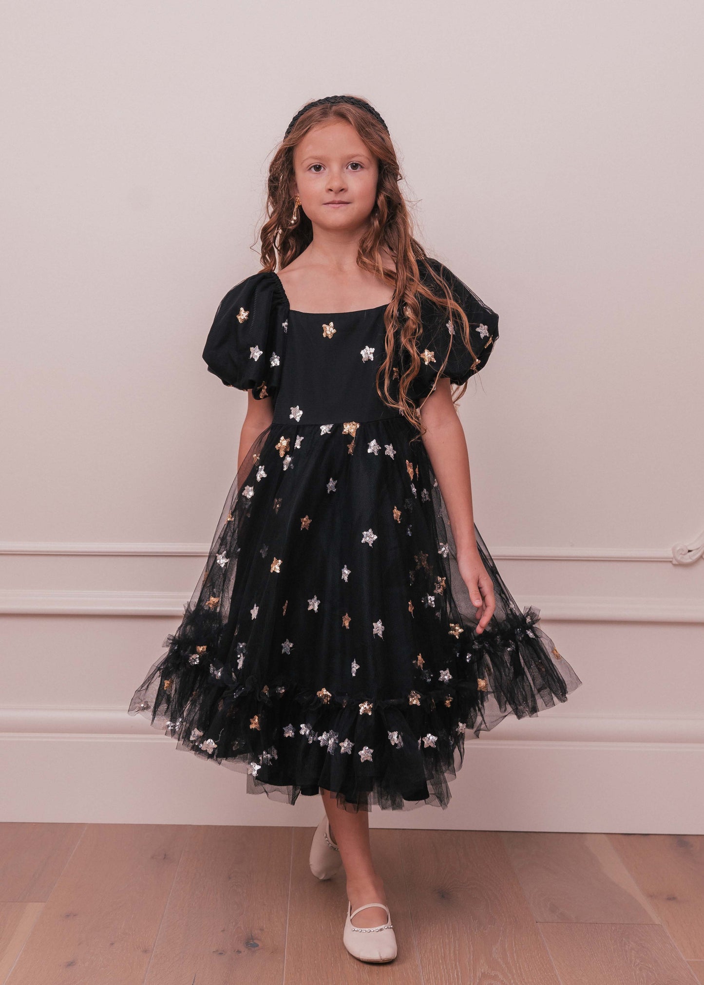 chic size inclusive model wearing JessaKae Wendy Girls Girls Dress_Black Star / 18-24M  Girls Dress