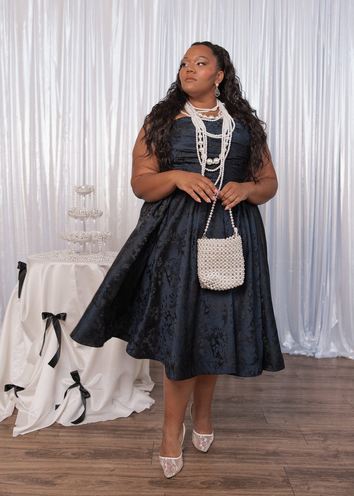 chic size inclusive model wearing JessaKae Winslow Dress