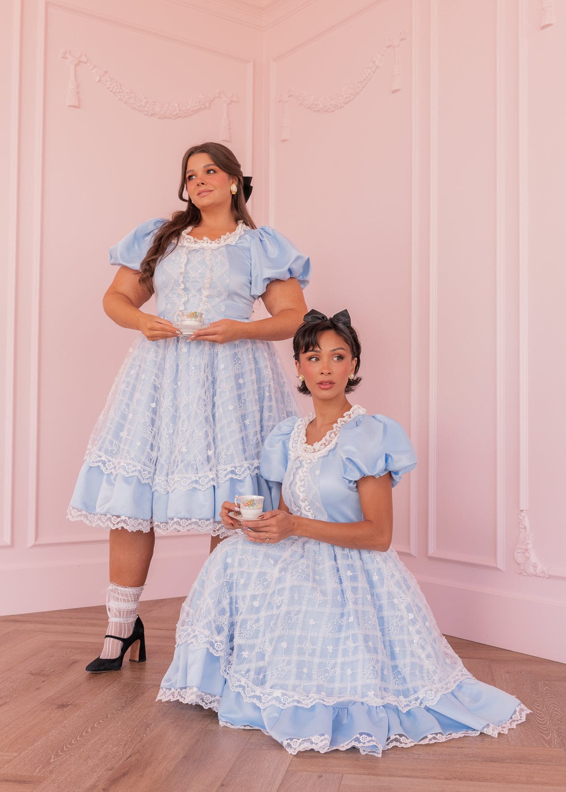 chic size inclusive model wearing JessaKae Wonderland Dress