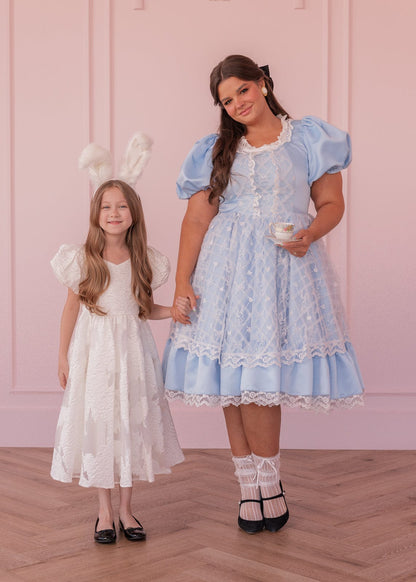 chic size inclusive model wearing JessaKae Wonderland Dress