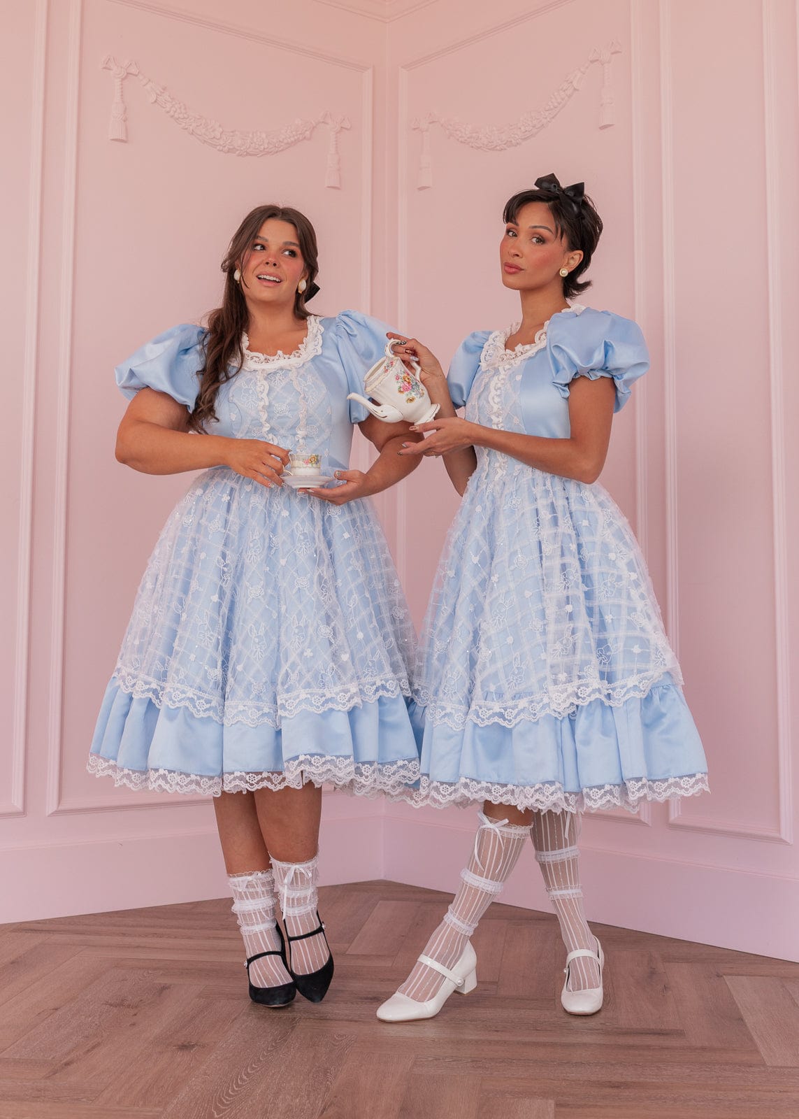 chic size inclusive model wearing JessaKae Wonderland Dress