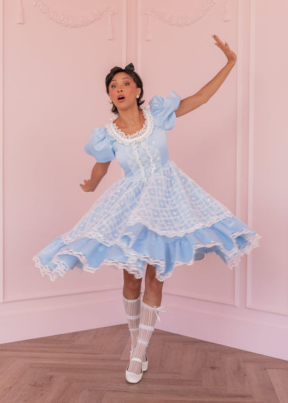 chic size inclusive model wearing JessaKae Wonderland Dress