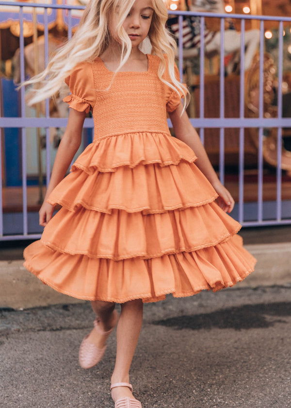 chic size inclusive model wearing JessaKae Free Spirit Girls Dress Clementine / 12-18M Girls Dress