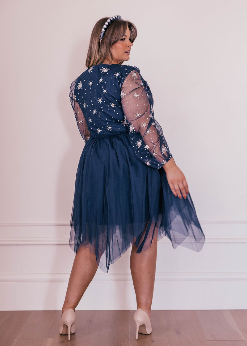 chic size inclusive model wearing JessaKae Mystic Dress Dresses
