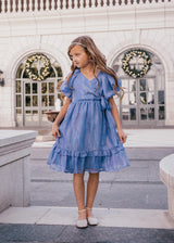 chic size inclusive model wearing JessaKae Pixie Girls Dress Girls Dress