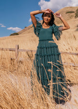 chic size inclusive model wearing JessaKae Senna Tulle Dress Forest / XXS Dresses
